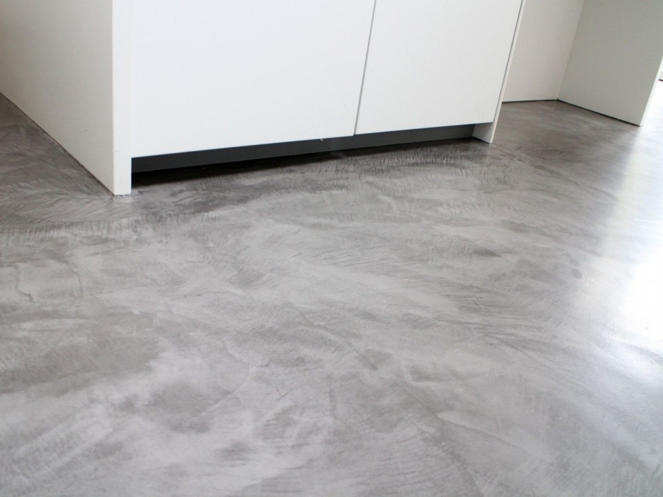 1683476360517 Grey microcement flooring in a modern kitchen interior